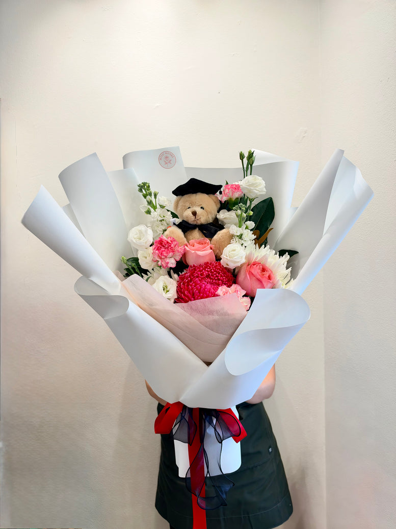 White and red teddy bear graduation bouquet