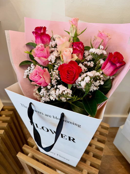 Lovely red and light pink standard bouquet